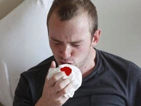 Coughing up blood can be a symptom of TB